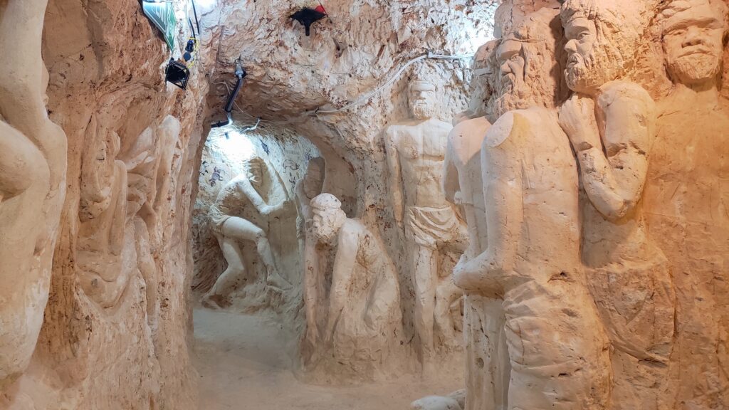 Chambers of the Black Hand, sculptures carved in a former opal mine