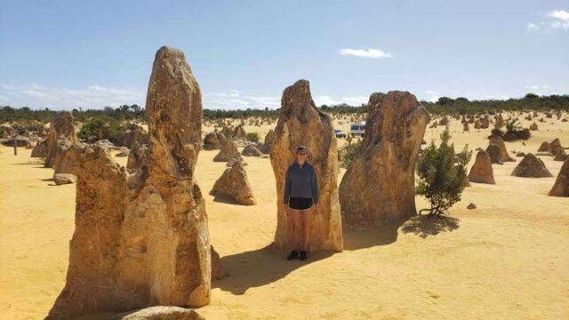 Girl standing in Pinnacle Desert, best day trip from Perth without a car