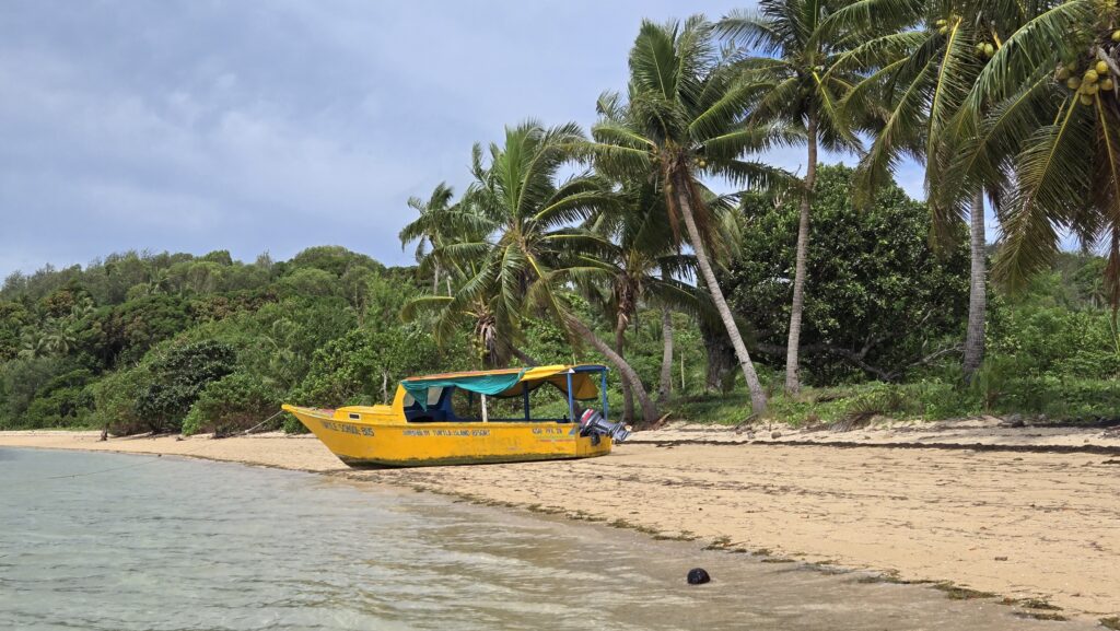 School bus boat on the beach of a local village in the Yasawa Islands, one of the most authentic parts of my Fiji budget trip